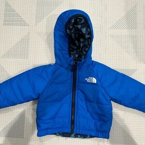 3-6M reversible blue down Northface down jacket. Like new!